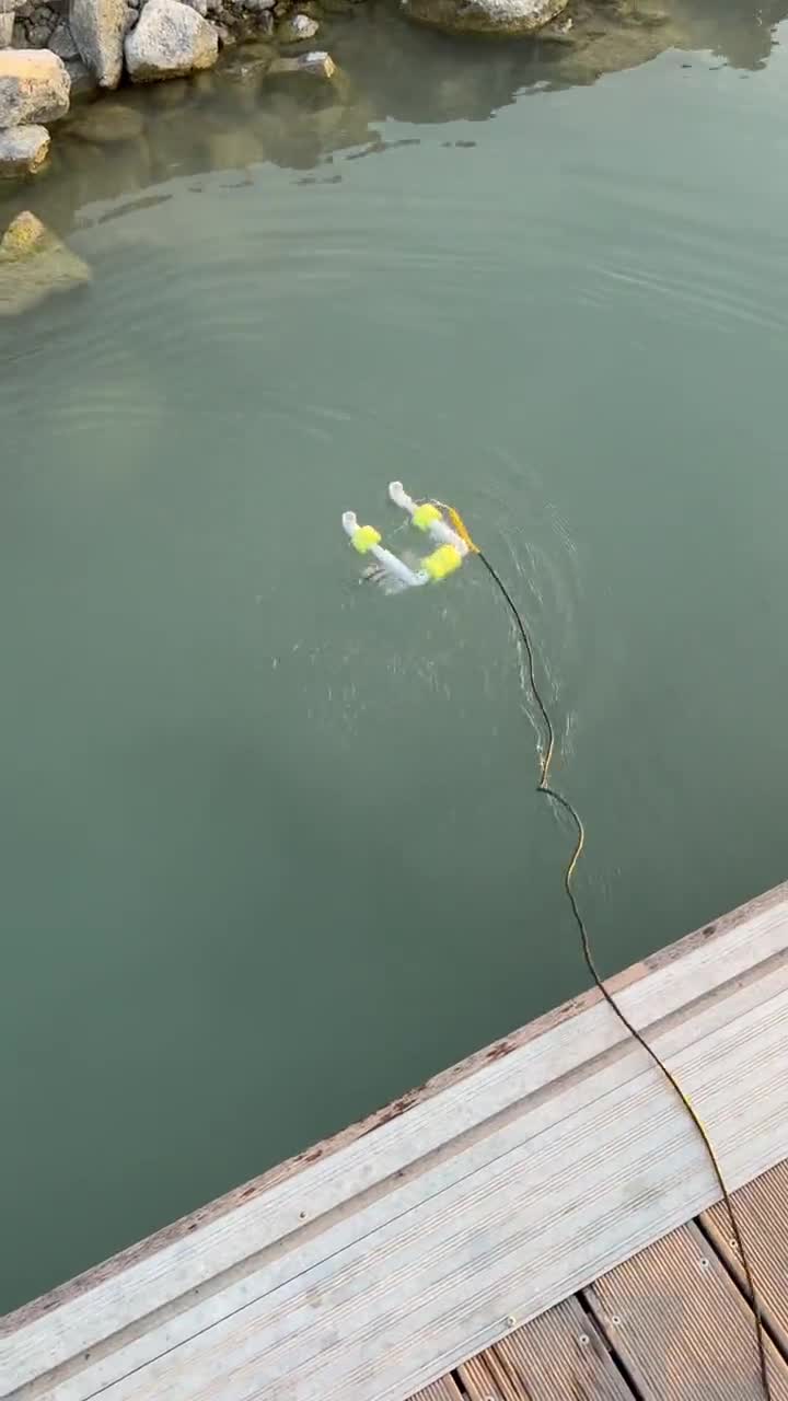 SeaPerch ROV floating in a pool